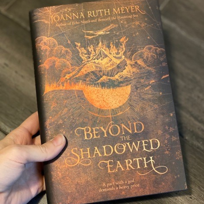 MLC CO January Unboxing Beyond the Shadowed Earth Book